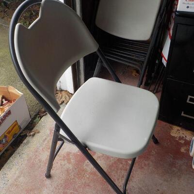 5 Clean foldable chairs.