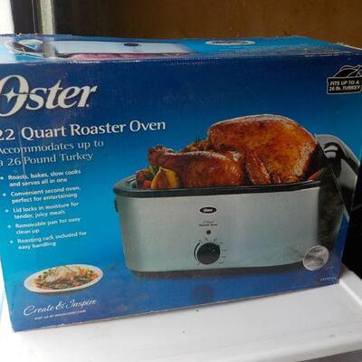 NEW Oster 22 Quart Roaster Over. Cook 26 pound Turkey. 