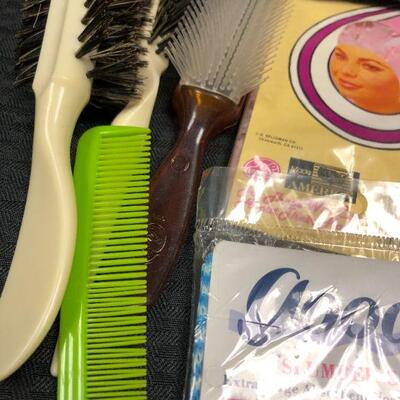 Lot of Vintage Hair Products; hair nets, combs, brushes, curlers, hair clip