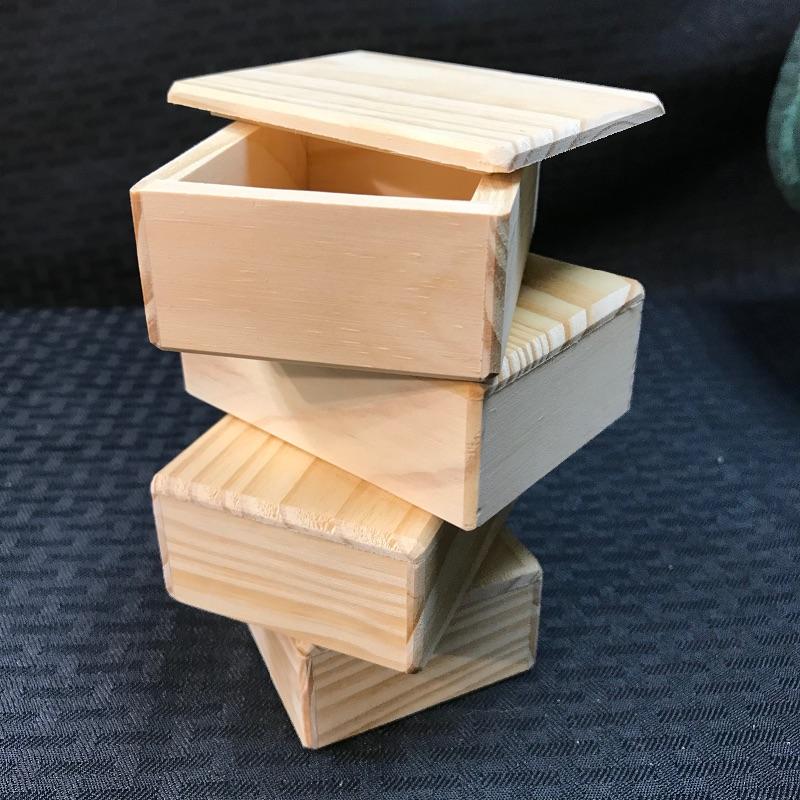 miniature wooden boxes