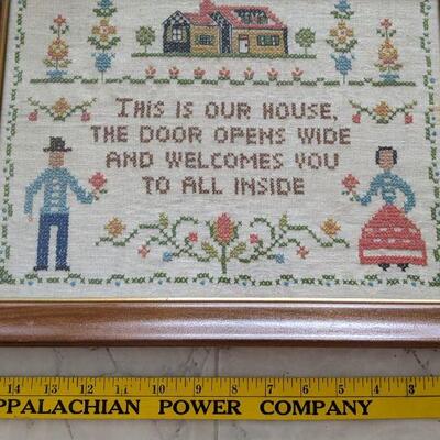 Lot # 7 -Vintage Cross stitch in Wooden Frame THIS IS OUR HOUSE, THE DOOR OPENS WIDE...