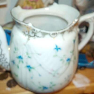 " 1800's Tea pot with European tag.