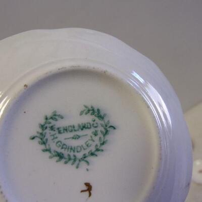 Lot 60 - Porcelain Demitasse Saucers