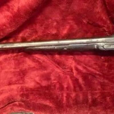 Unmarked antique double barrel 12 gauge shotgun, very heavy duty.