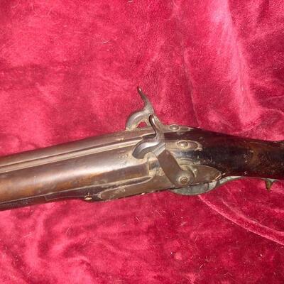 Unmarked antique double barrel 12 gauge shotgun, very heavy duty.
