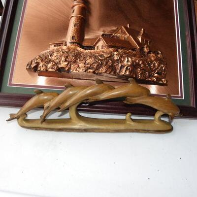 Beautiful Copper Light House portrait and wood dolphins.