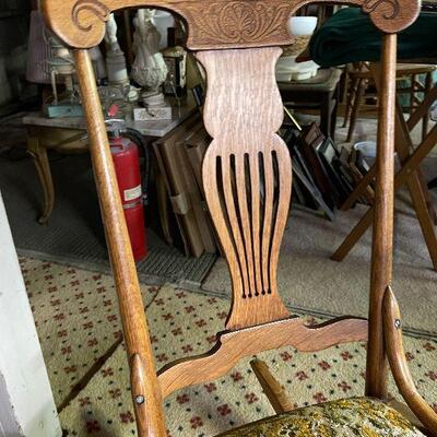 L91: Antique Rocking Chair