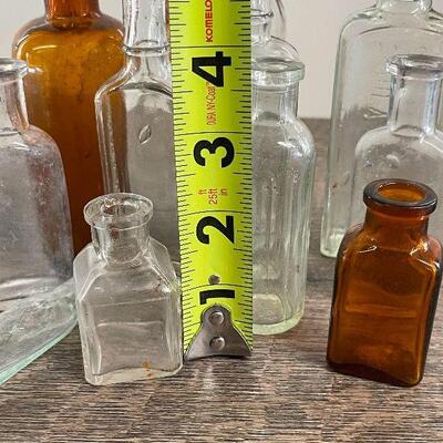 L123: Collection of Small Bottles