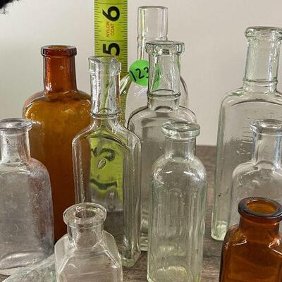 L123: Collection of Small Bottles