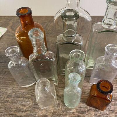 L123: Collection of Small Bottles