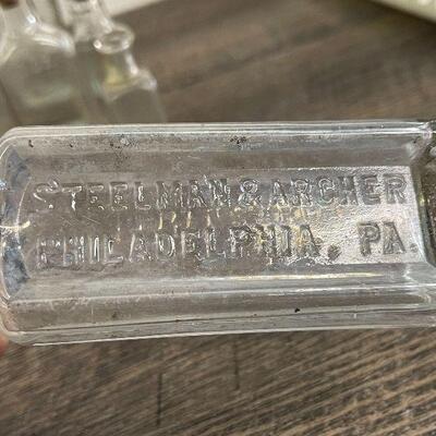 L124: Collection of Small Bottles