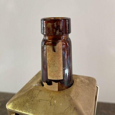L154: Mr. Tilford whiskey Blend On metal stands on music box