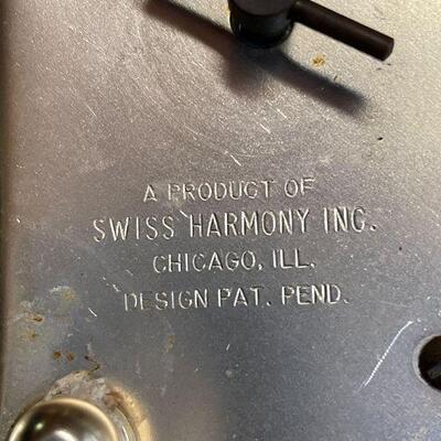 L154: Mr. Tilford whiskey Blend On metal stands on music box