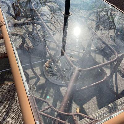 224: Metal and Glass outdoor Table and Chairs and Umbrella