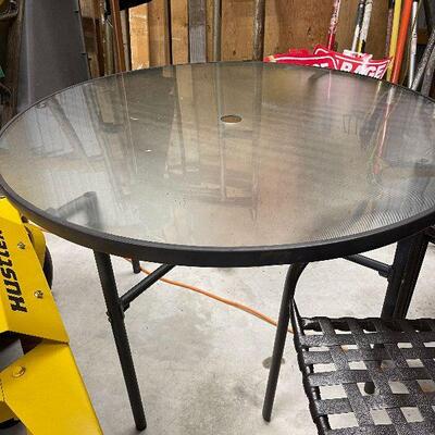 243: Glass Table and Four Chairs