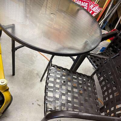 243: Glass Table and Four Chairs