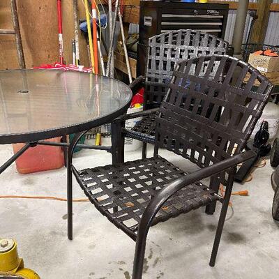 243: Glass Table and Four Chairs