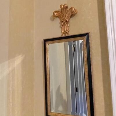 Black and gold pair of mirrors