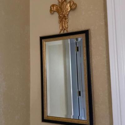 Black and gold pair of mirrors