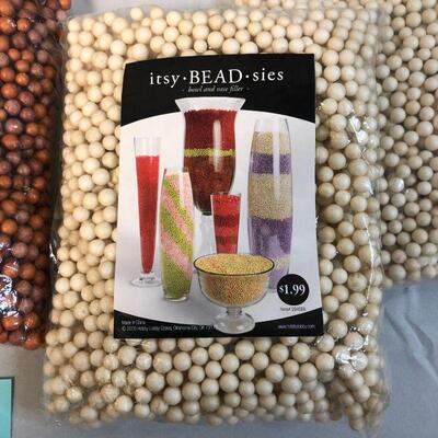 Four Bags of Bowl and Vase Filler Beads