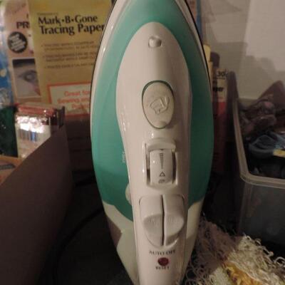 CLOTHES IRON AND SEWING