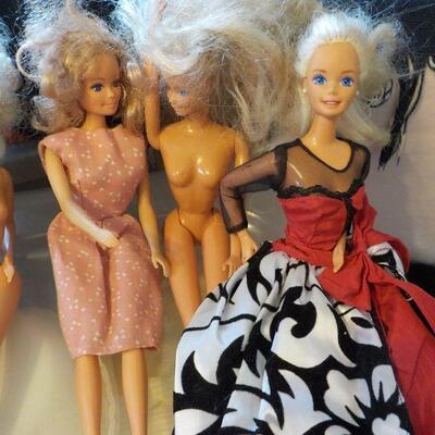 5- 1985's Barbie dolls.