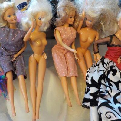 5- 1985's Barbie dolls.