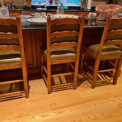 Three Hancock and Moore custom stools