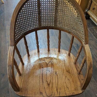 Vintage Oak Can Back Rolling Chair 