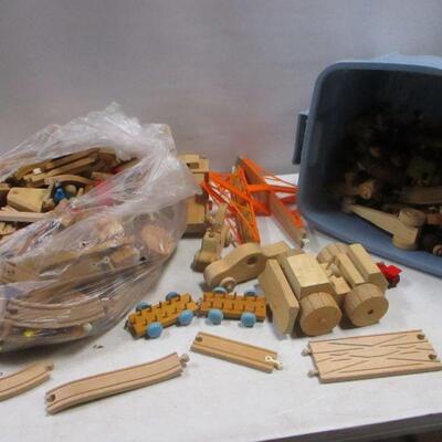 Lot 183 - Storage Container Of Wooden Toys & Parts