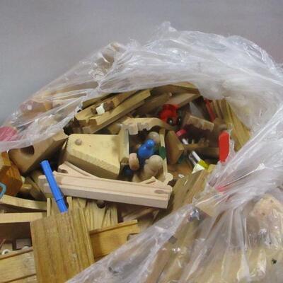 Lot 183 - Storage Container Of Wooden Toys & Parts