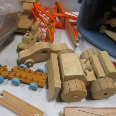 Lot 183 - Storage Container Of Wooden Toys & Parts