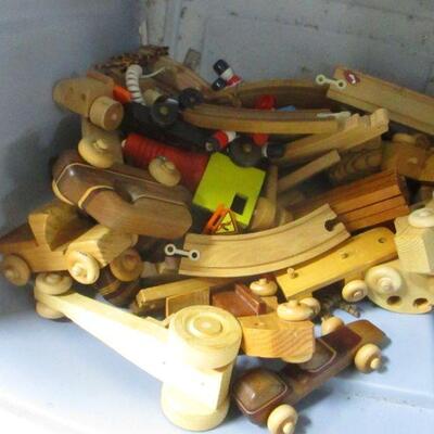 Lot 183 - Storage Container Of Wooden Toys & Parts