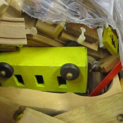 Lot 183 - Storage Container Of Wooden Toys & Parts