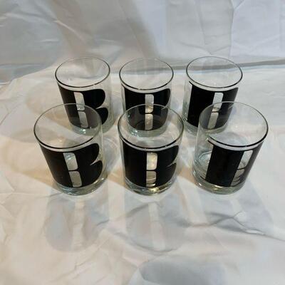 Six monogram tumblers 