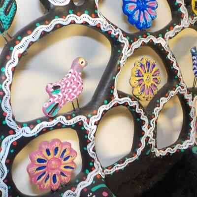 Mexican wall art with small basket; basket has drainage hold, so could be used as planter. Metal jewelry holder.