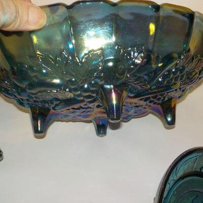 Vintage Blue Carnival Glass  blue iridescent carnival glass: footed candy dish with lid, two goblets, oval footed bowl with fruit on...