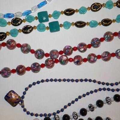 New hand crafted necklaces w/ real and synthetic stones.