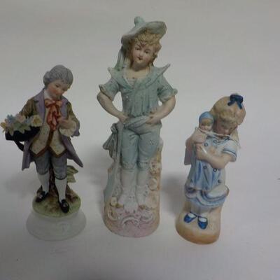3 Hand crafted German figurines.