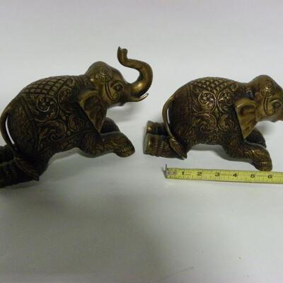 2- 9 inch Brass Elephants.