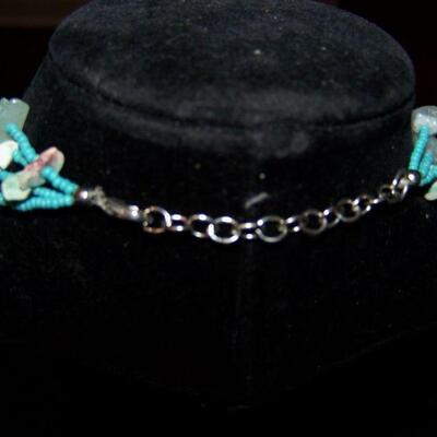 LOT 6  TURQUOISE COLORED FETISH LIKE NECKLACE AND BRACLET