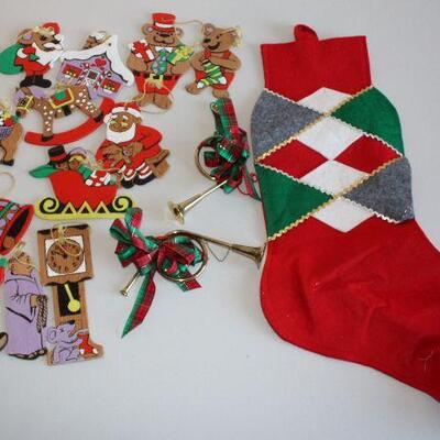 Wooden Christmas ornaments, French horns, and a Christmas sock