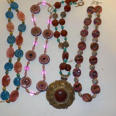 4- Peruvian  style necklaces new.