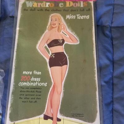 Collection of 12 Vintage Paper Doll Sets