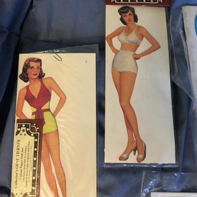 Collection of 12 Vintage Paper Doll Sets