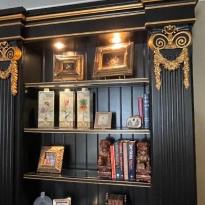 Custom wood wall unit in black and gold