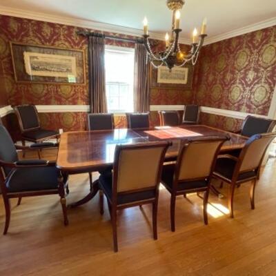 Dining room table with 10 custom Italian chairs and two additional leaves