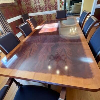 Dining room table with 10 custom Italian chairs and two additional leaves