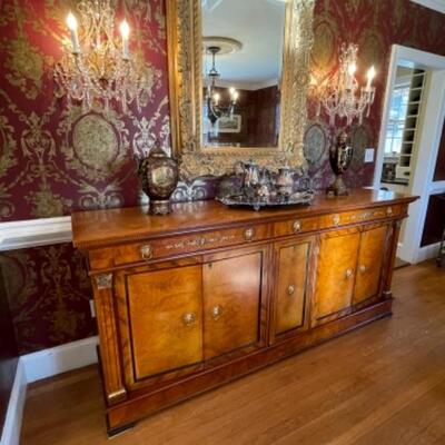 Antique sideboard with gold accents