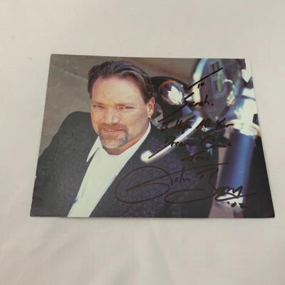 .37. Two John Berry Autographed 8x10s
